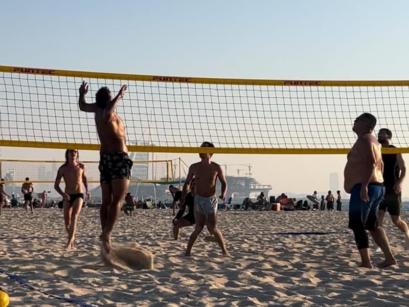 Califit beach volleyball community players enjoying a session